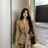 Qaqi-Colored Windwear Coat Women Autumn 2025 New Long Sleeves To Close The Waist Double Buckle Long Outer Coat