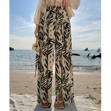 Bohemia Beach Skirts Women's Summer Seaside Wearing Thin Open Wide Leg Trousers Crushed Flowers Mop Trousers